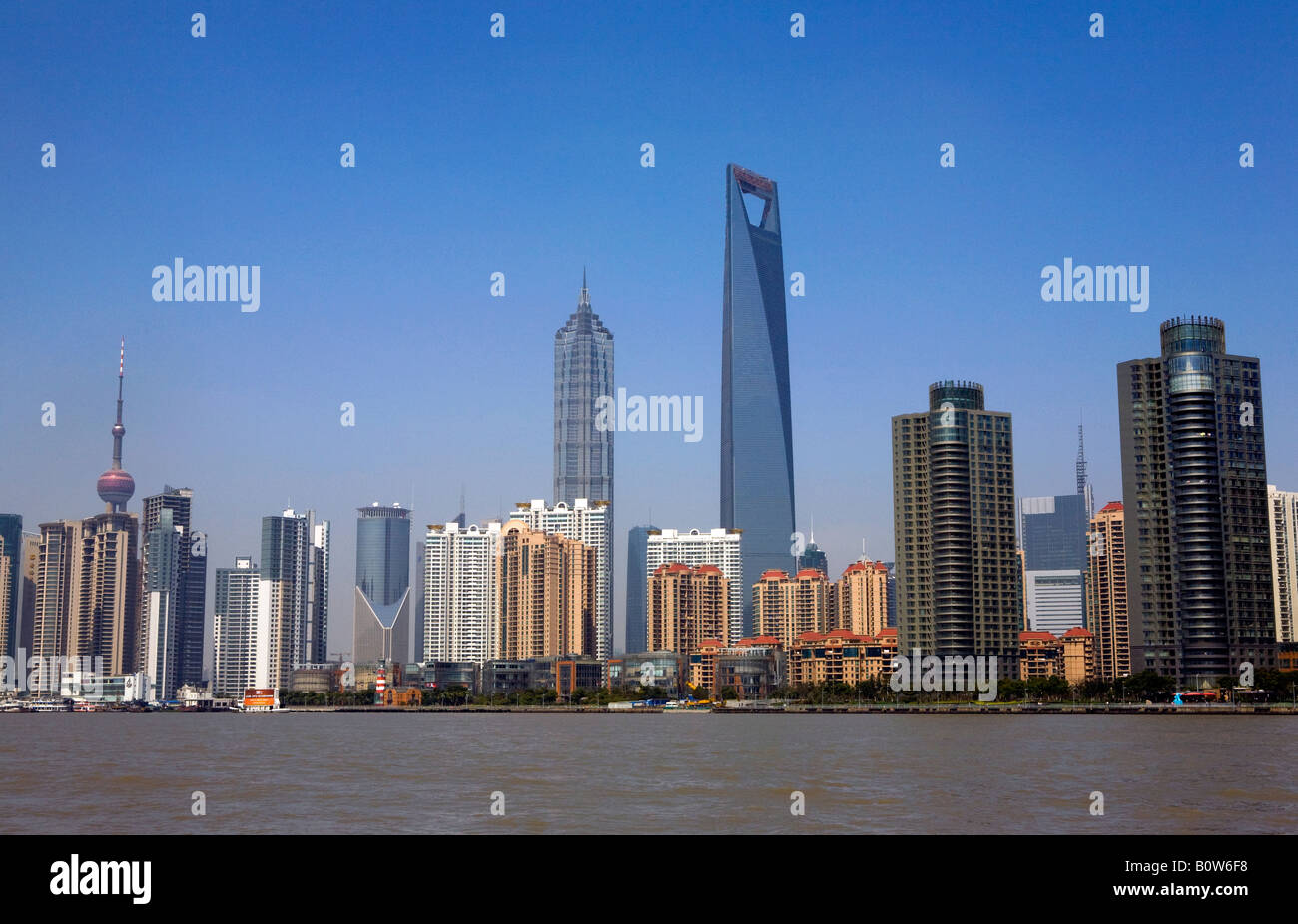 Pudong skyline consisting of the Oriental Pearl Tower, The Jin Mao Tower and the Shanghai World Financial Center in Shanghai. Stock Photo