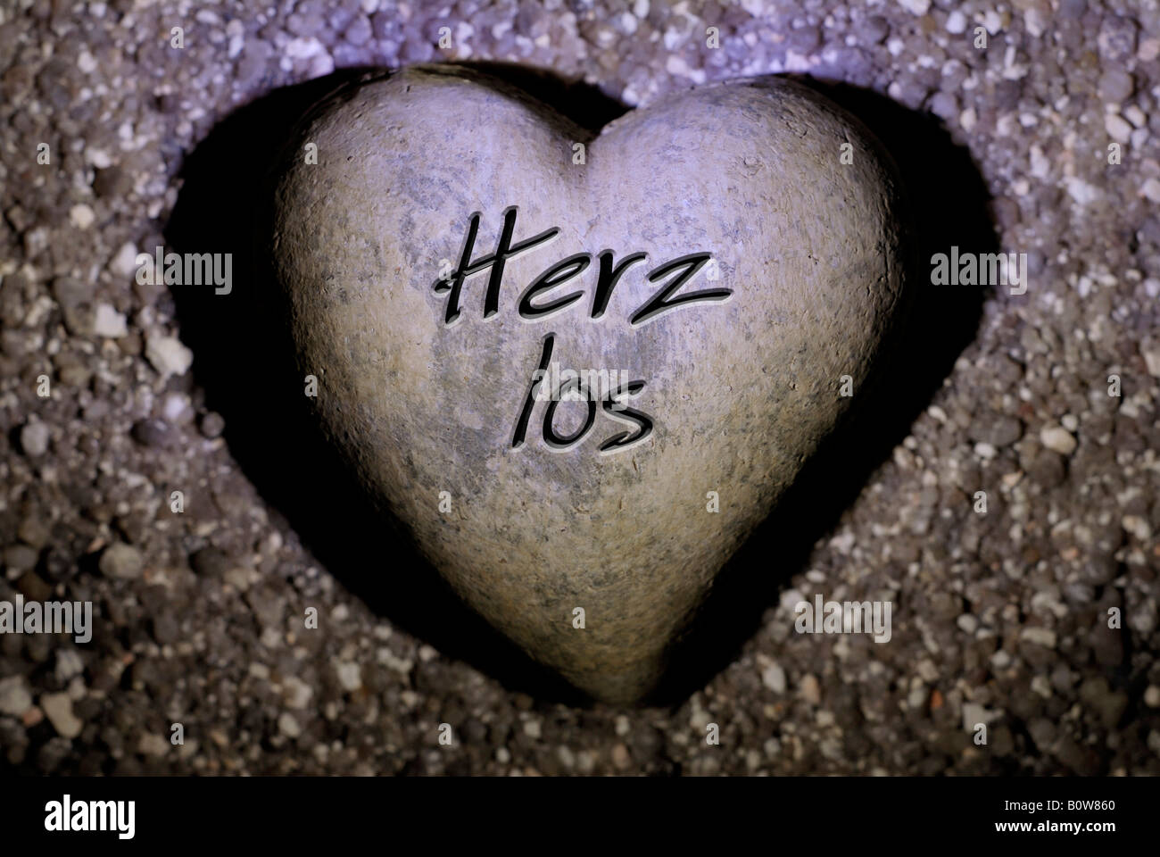Heart with inscription, "Herzlos" (heartless) Stock Photo