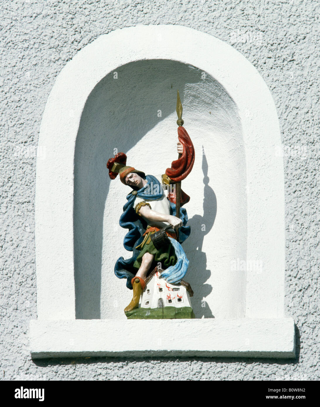 Statue of St. Florian, wall alcove of the fire brigade building, Gelting, Geretsried district, Upper Bavaria, Germany, Europe Stock Photo