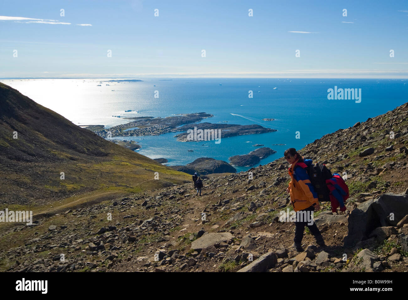 Hiker on Disko Island, Disko Bay, Greenland, Arctic Stock Photo