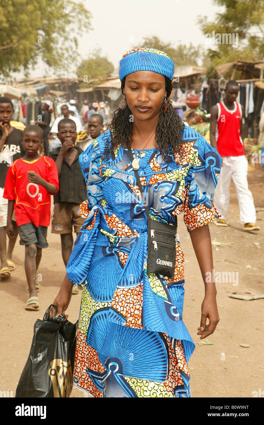 Woman walking through a market, Garoua, Cameroon, Africa ...
