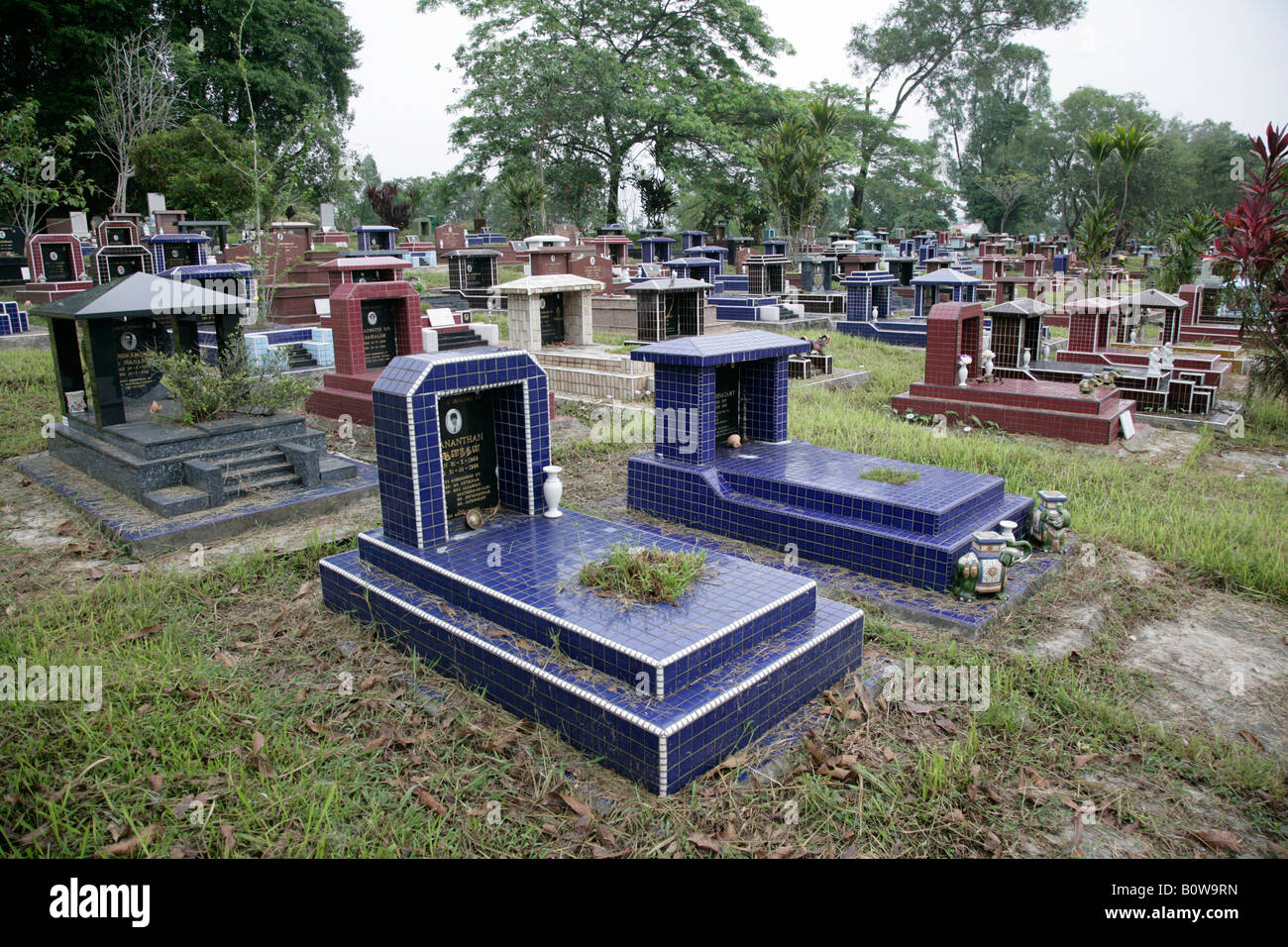 Burial plots at a multi-denominational cemetery in Singapore, Southeast Asia Stock Photo