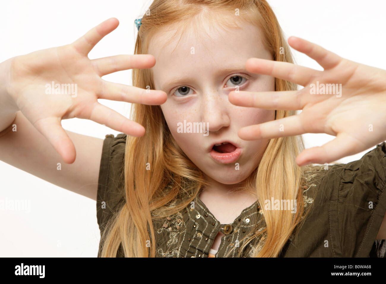 8-year-old girl, hands up showing her palms Stock Photo - Alamy