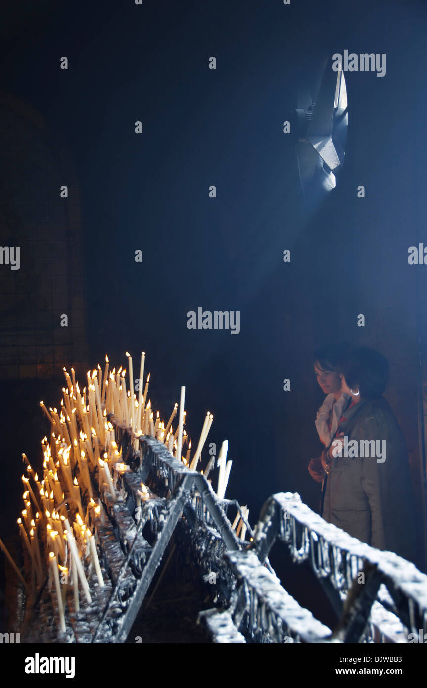 Votive candles in the side chapel of the church in El Rocio, Andalusia