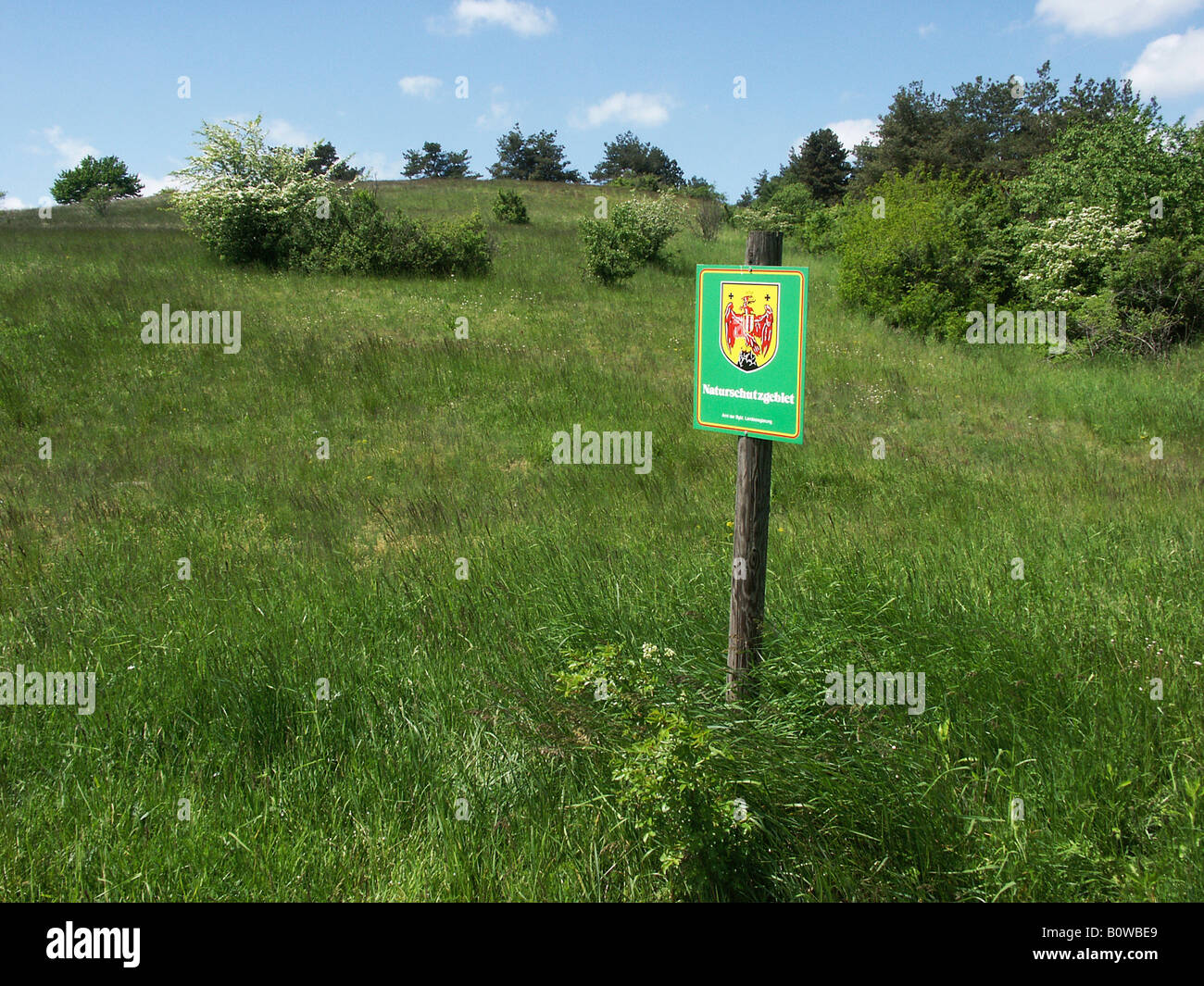Signboard on a dowel in a hilly open countryside, Burgenland, Austria Stock Photo