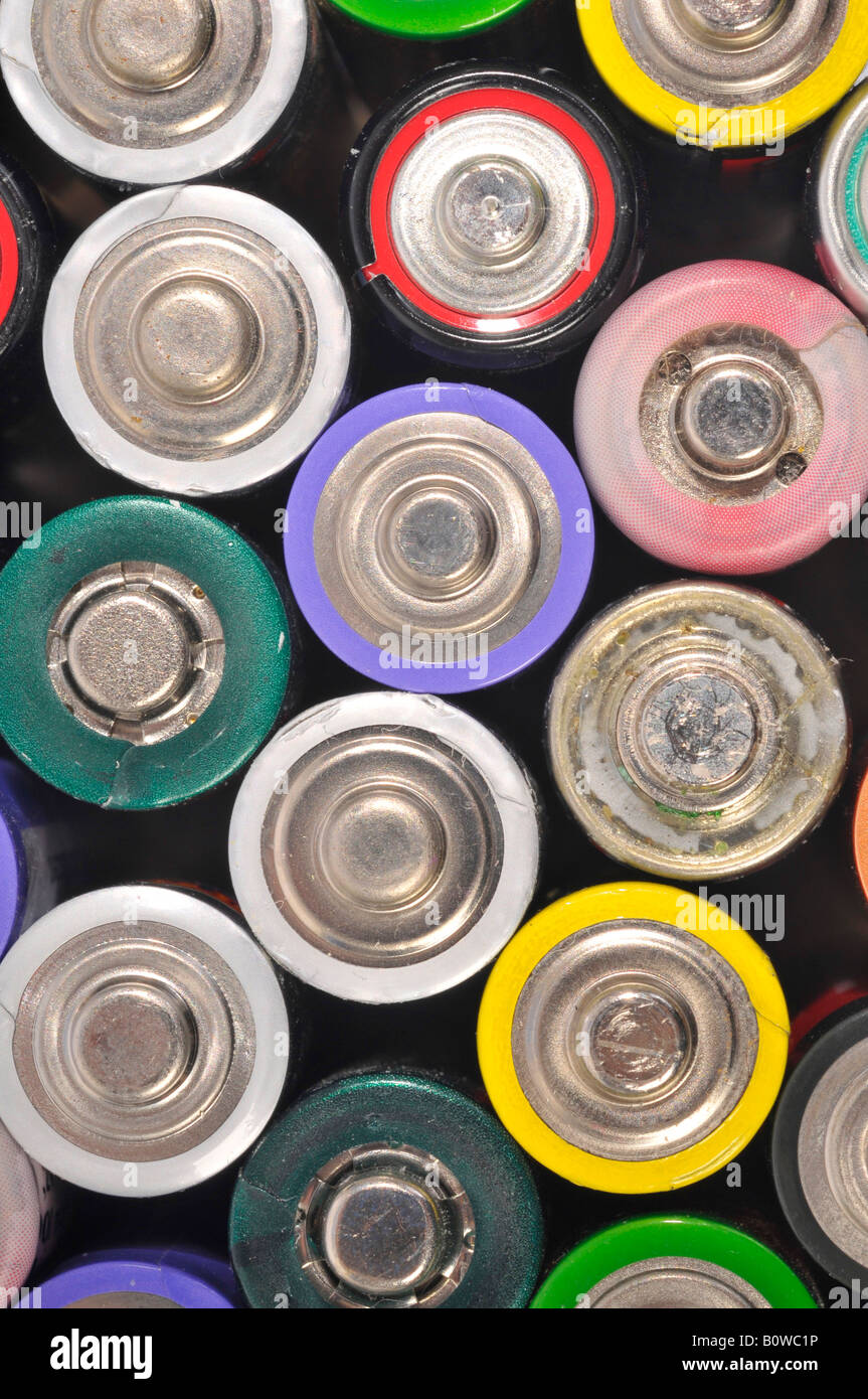 Used, empty AA and rechargeable batteries Stock Photo