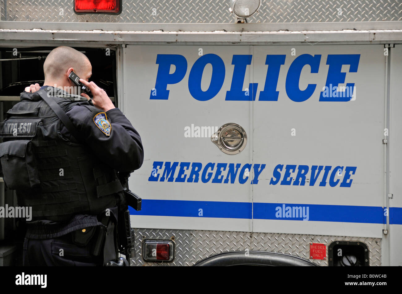 Police outside the New York Stock Exchange, NYSE, Wall Street, Manhattan, New York City, USA Stock Photo