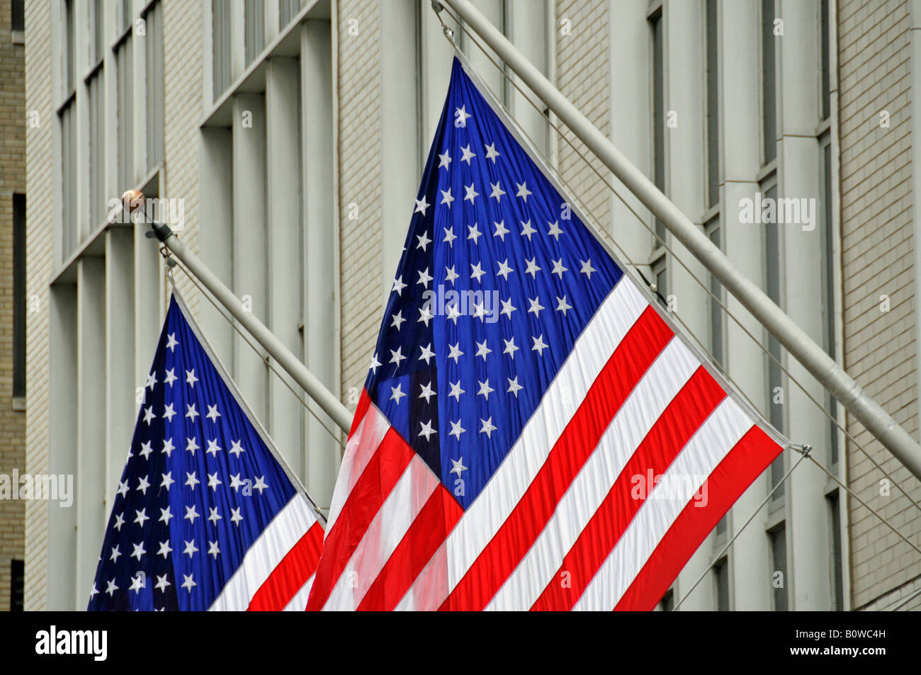 US flags, New York Stock Exchange, NYSE, Wall Street, Manhattan, New York City, USA Stock Photo
