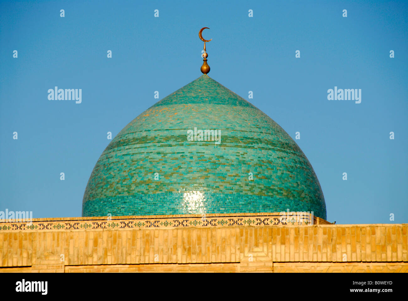 Turquoise blue shining dome of the Kalon Mosque, Buchara, Uzbekistan, Central Asia Stock Photo