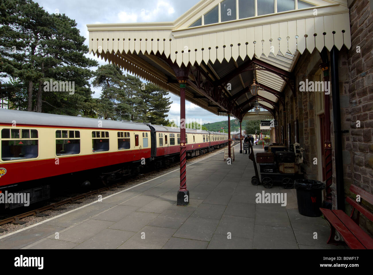 A passenger steam train at station in the Cotswolds,Britain