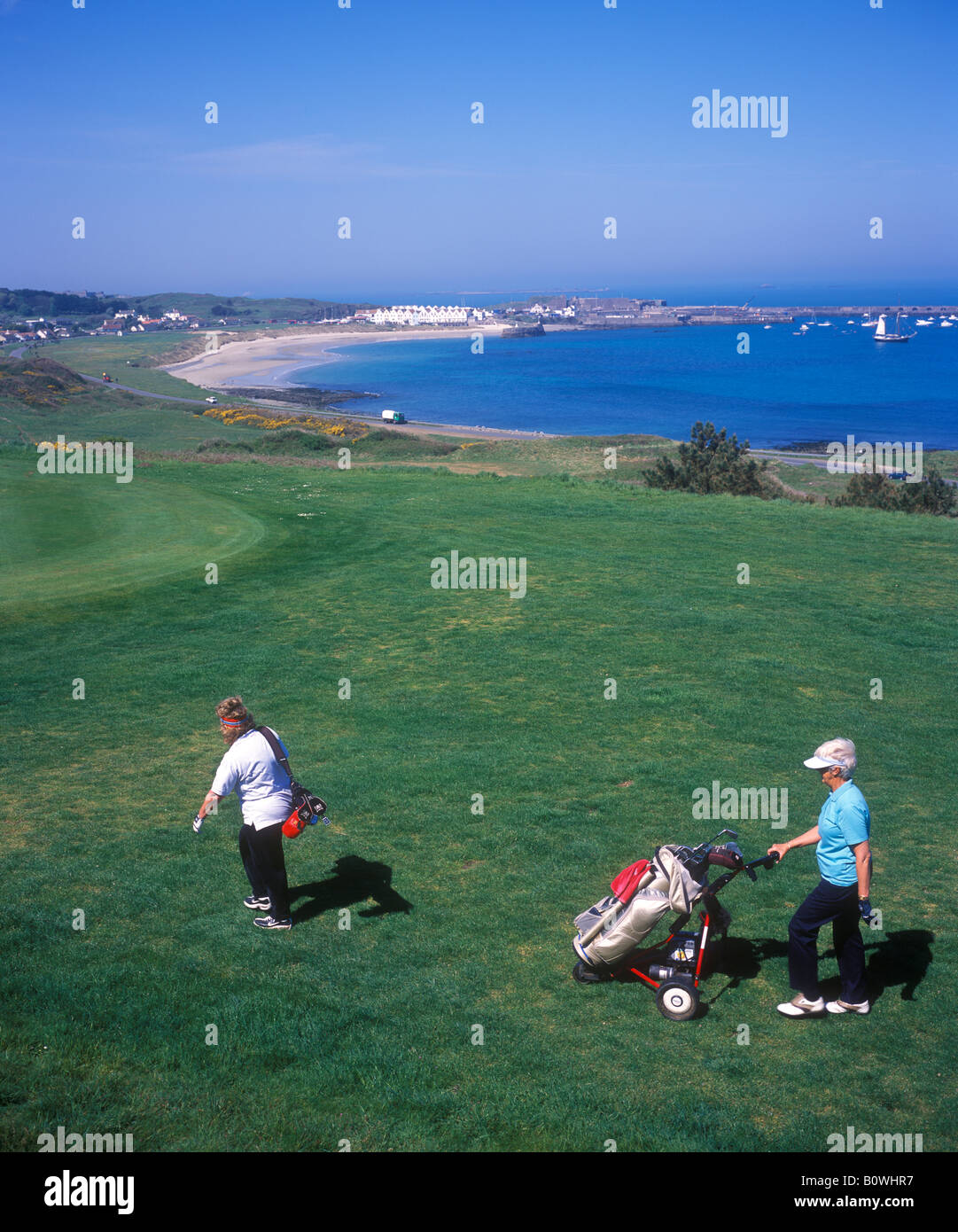 golf course and Braye Harbour, Alderney Island Stock Photo