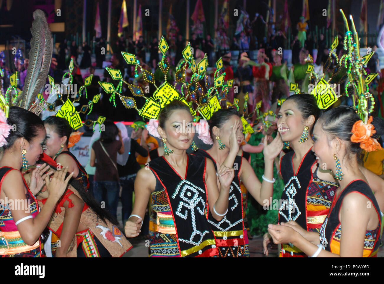 Dayak natives dance during Colours Of Malaysia celebration Stock Photo
