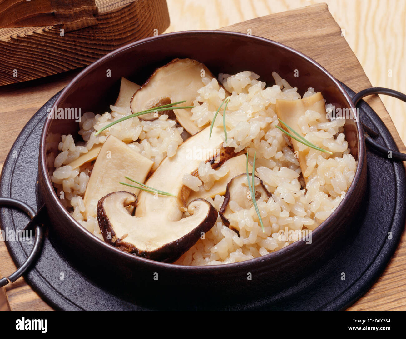 Steamed rice with matsutake mushrooms Stock Photo Alamy