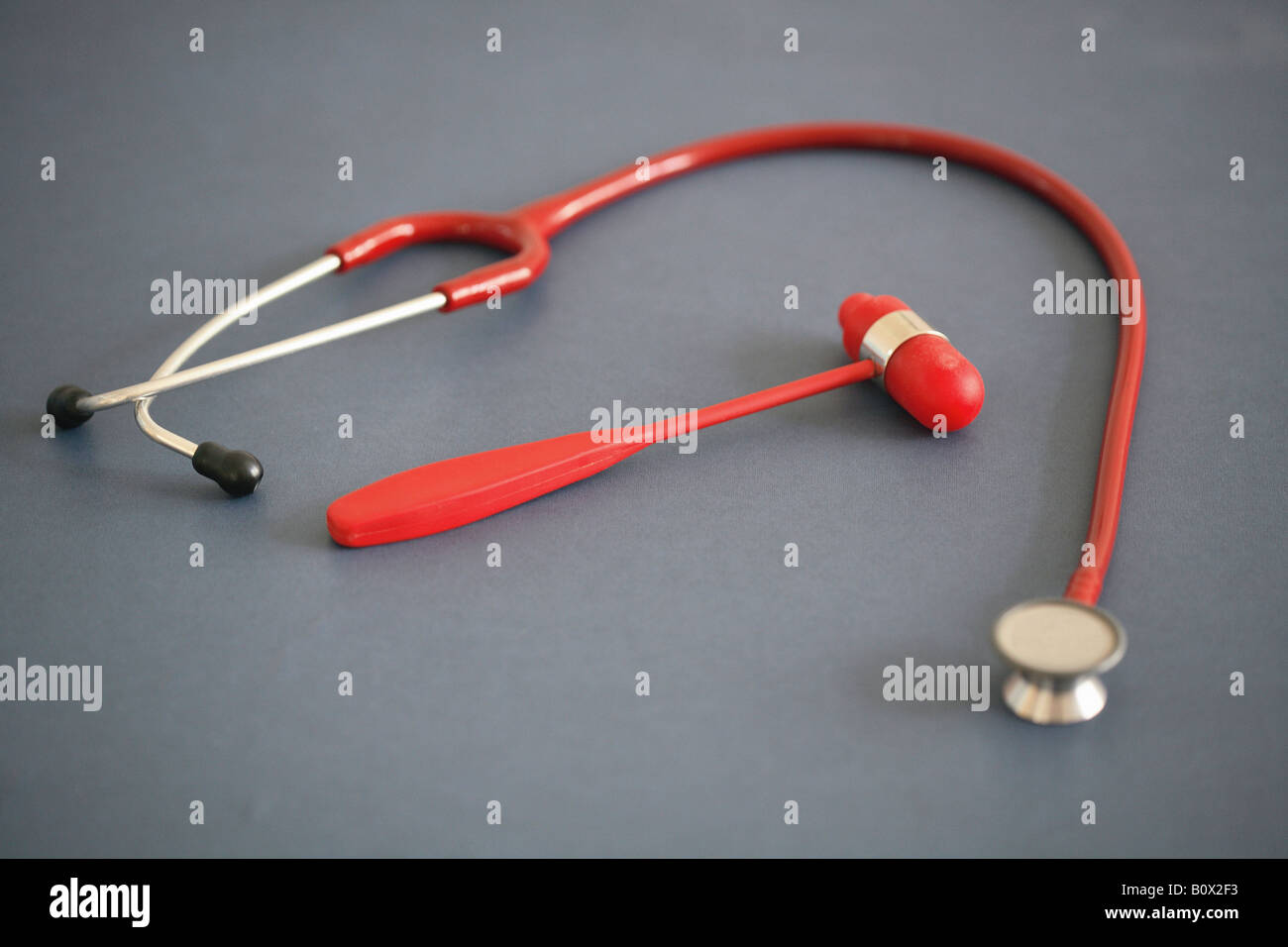 Medical Instruments Still life, stethoscope, reflex hammer Stock Photo
