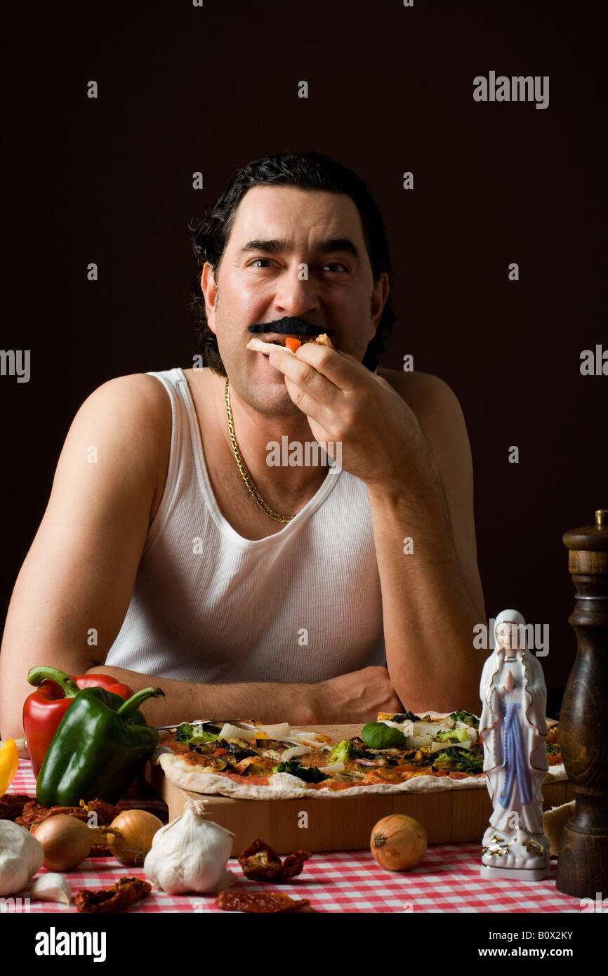 Stereotypical Italian Man eating pizza Stock Photo Alamy