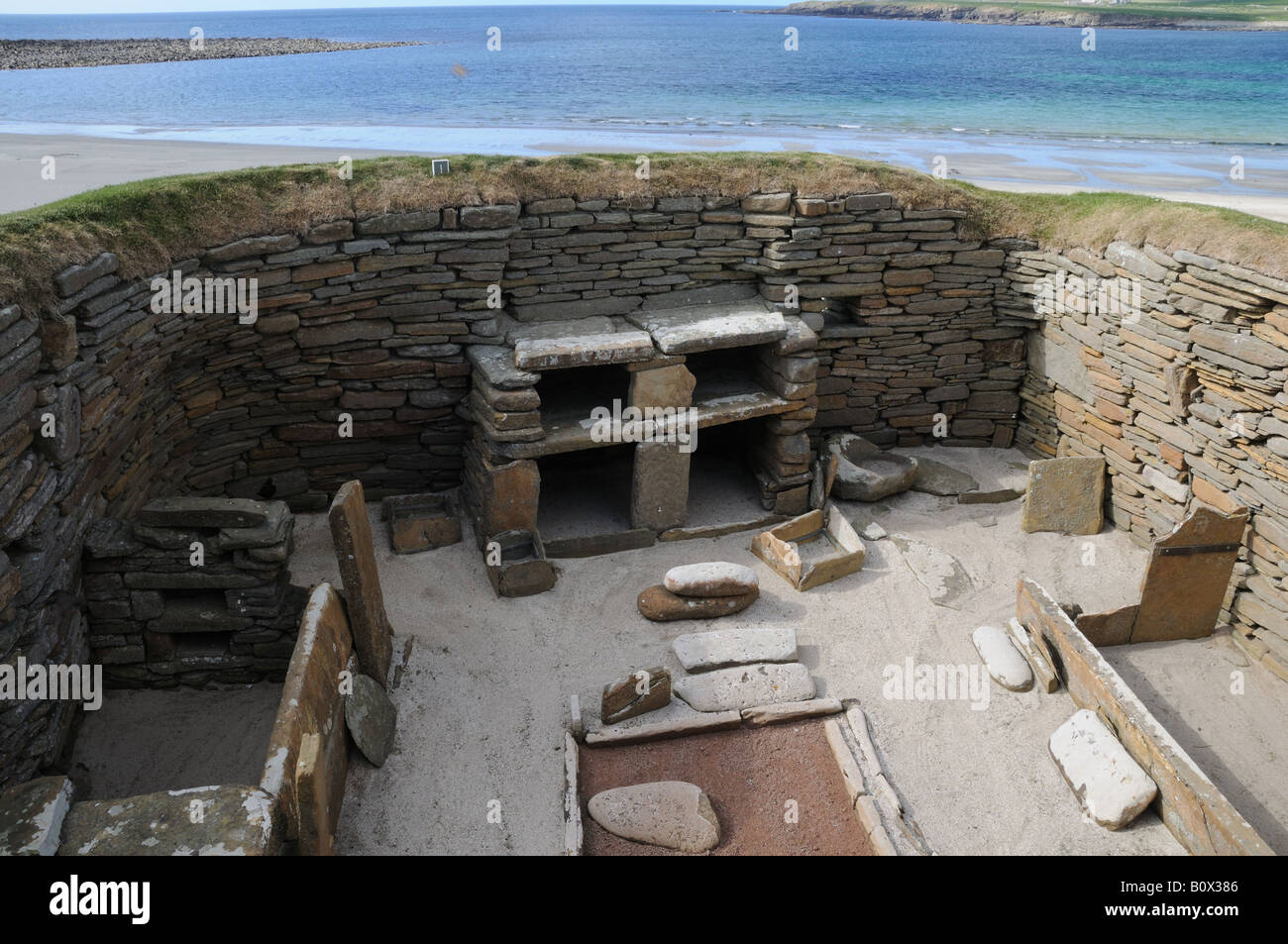Skara Brae on mainland Orkney is a 5,000-year-old settlement next to the Bay of Skaill. Stock Photo