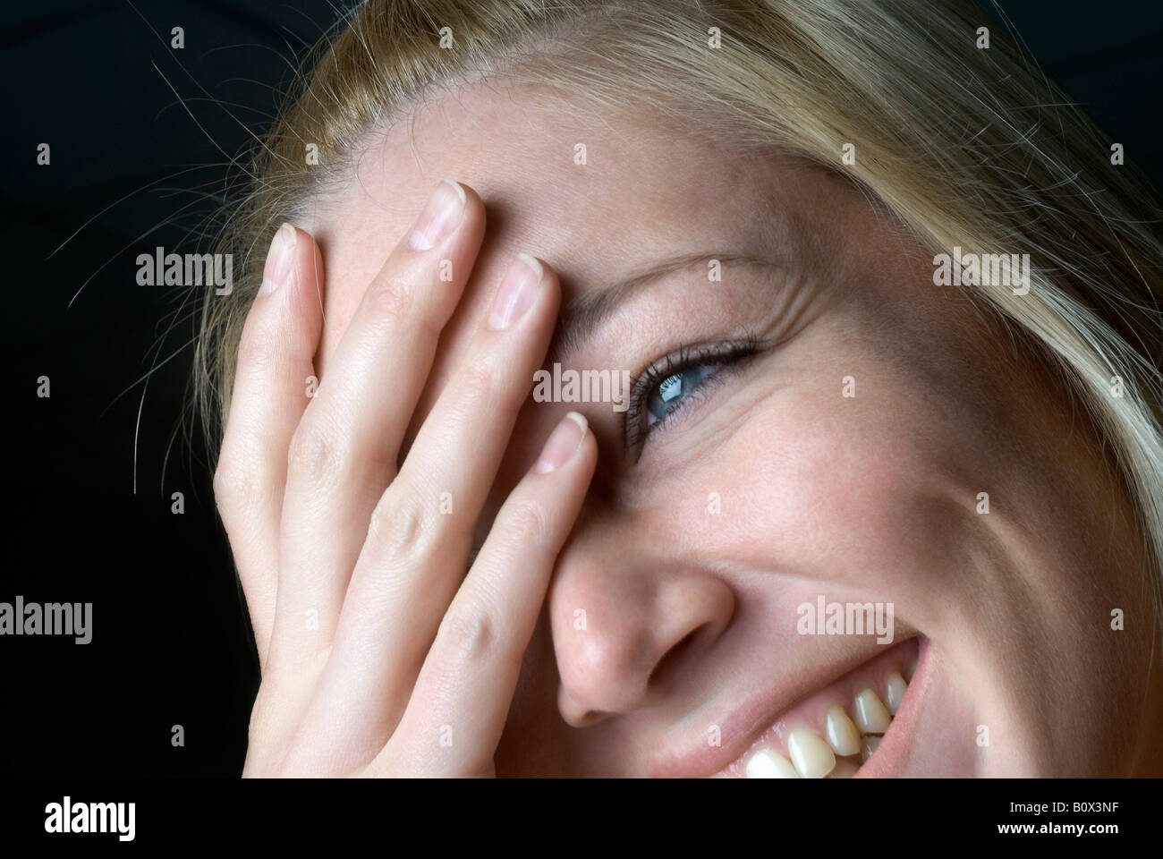 Portrait of a woman laughing, close up Stock Photo