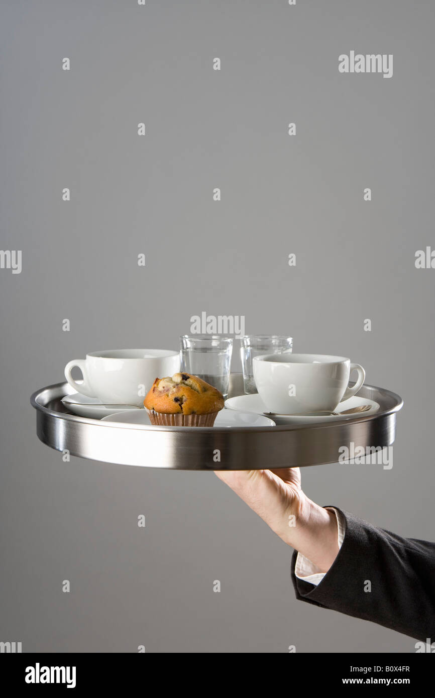Waiter carrying food tray hi-res stock photography and images - Alamy