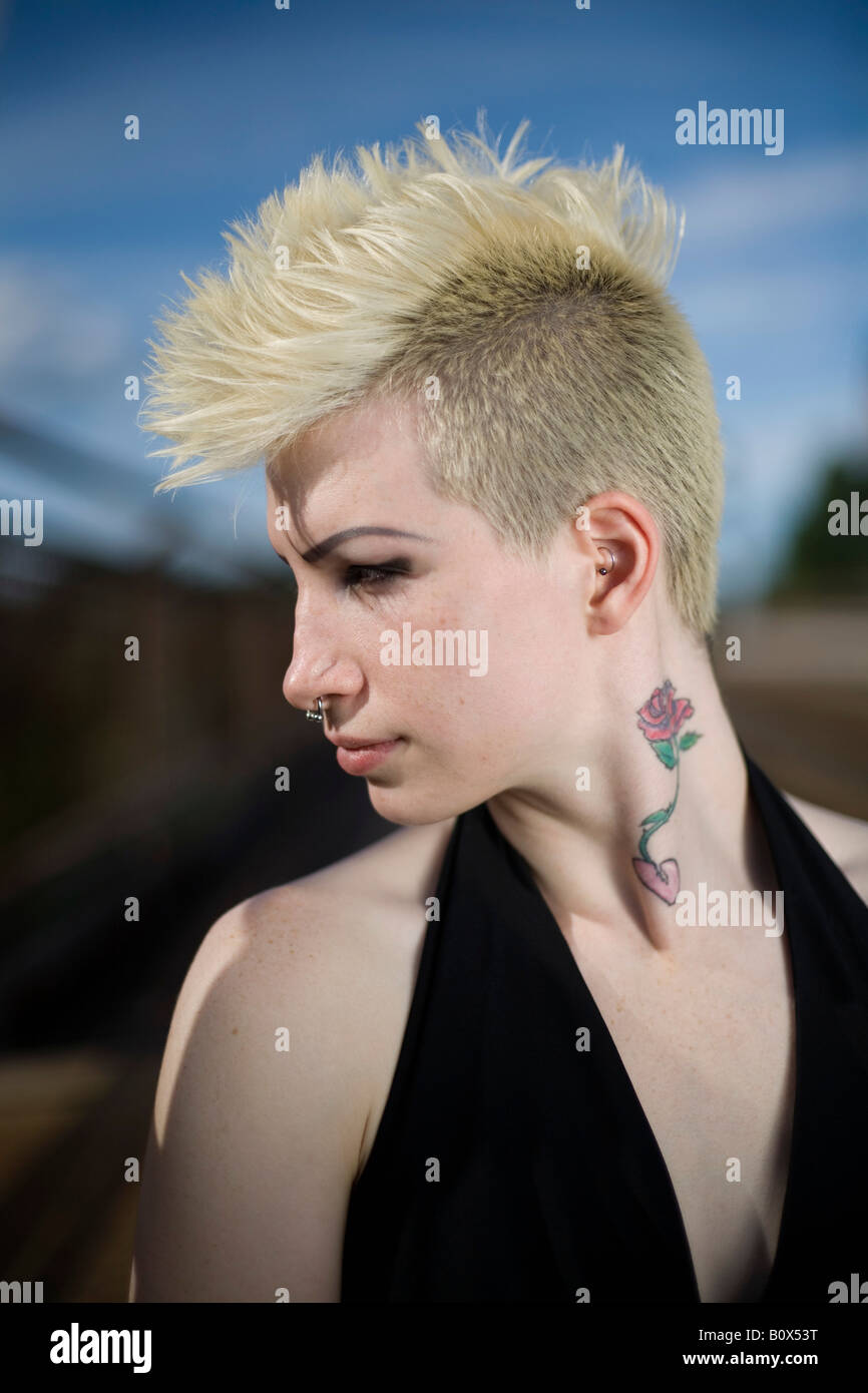 Profile of a young woman with a mohawk Stock Photo - Alamy