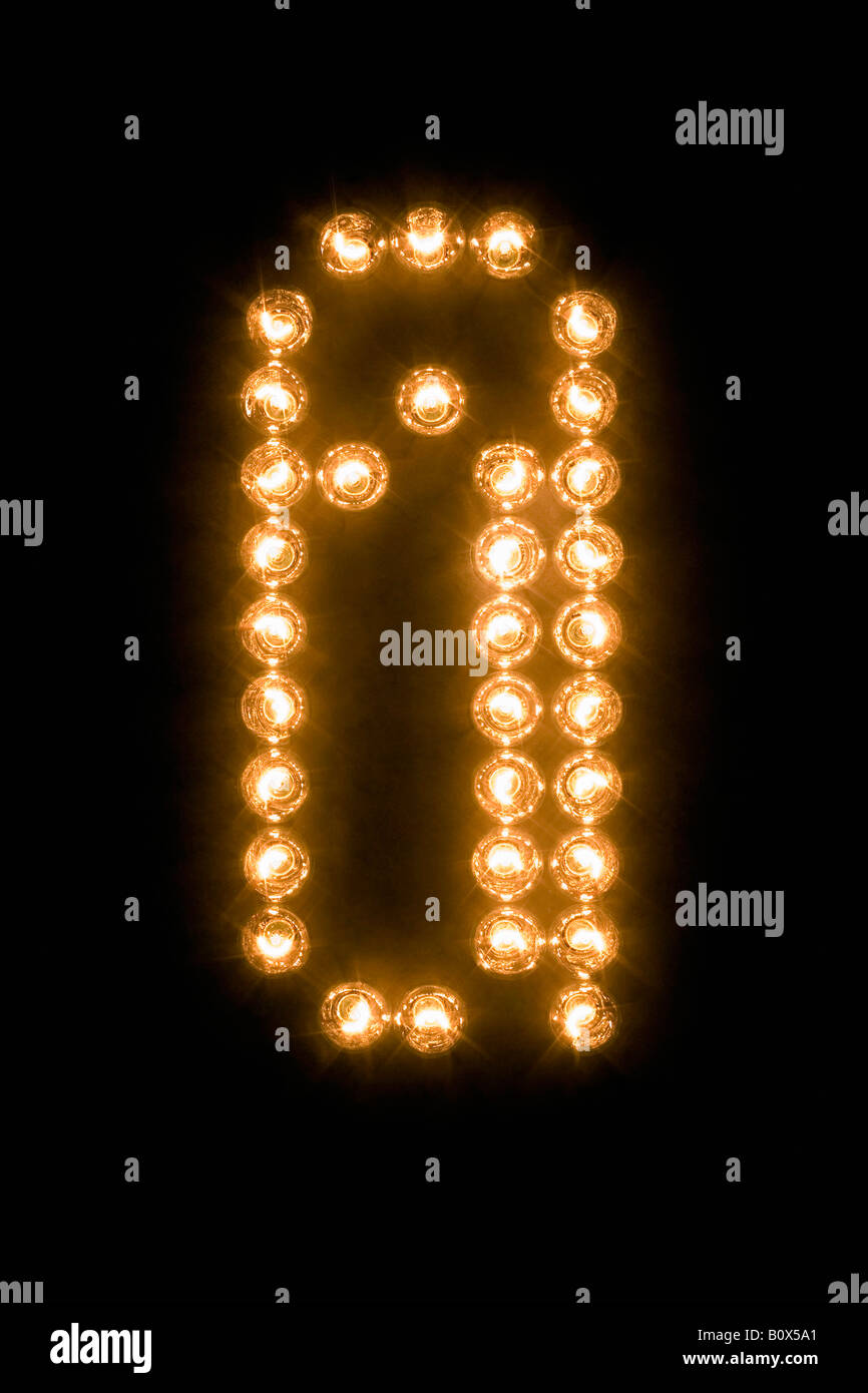 A paper clip symbol in illuminated light bulbs Stock Photo
