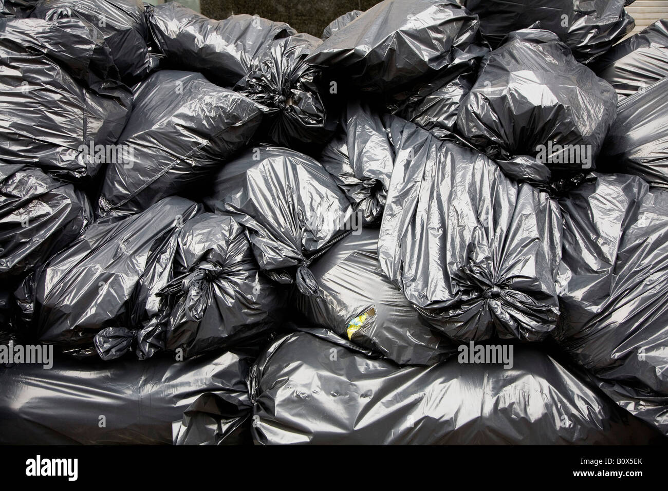 A pile of black rubbish bags Stock Photo - Alamy