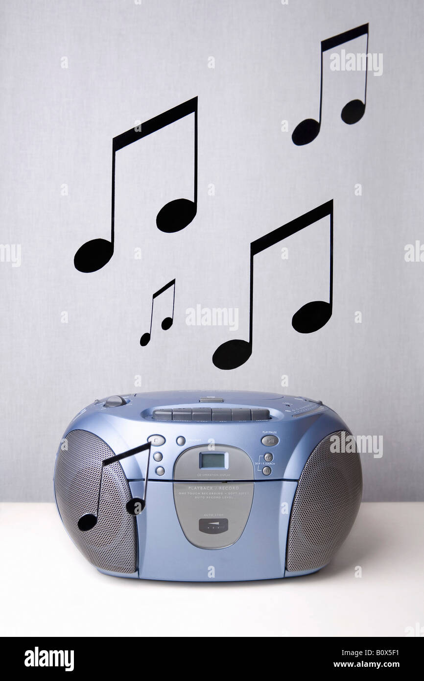 Musical notes coming out of a real boom box Stock Photo