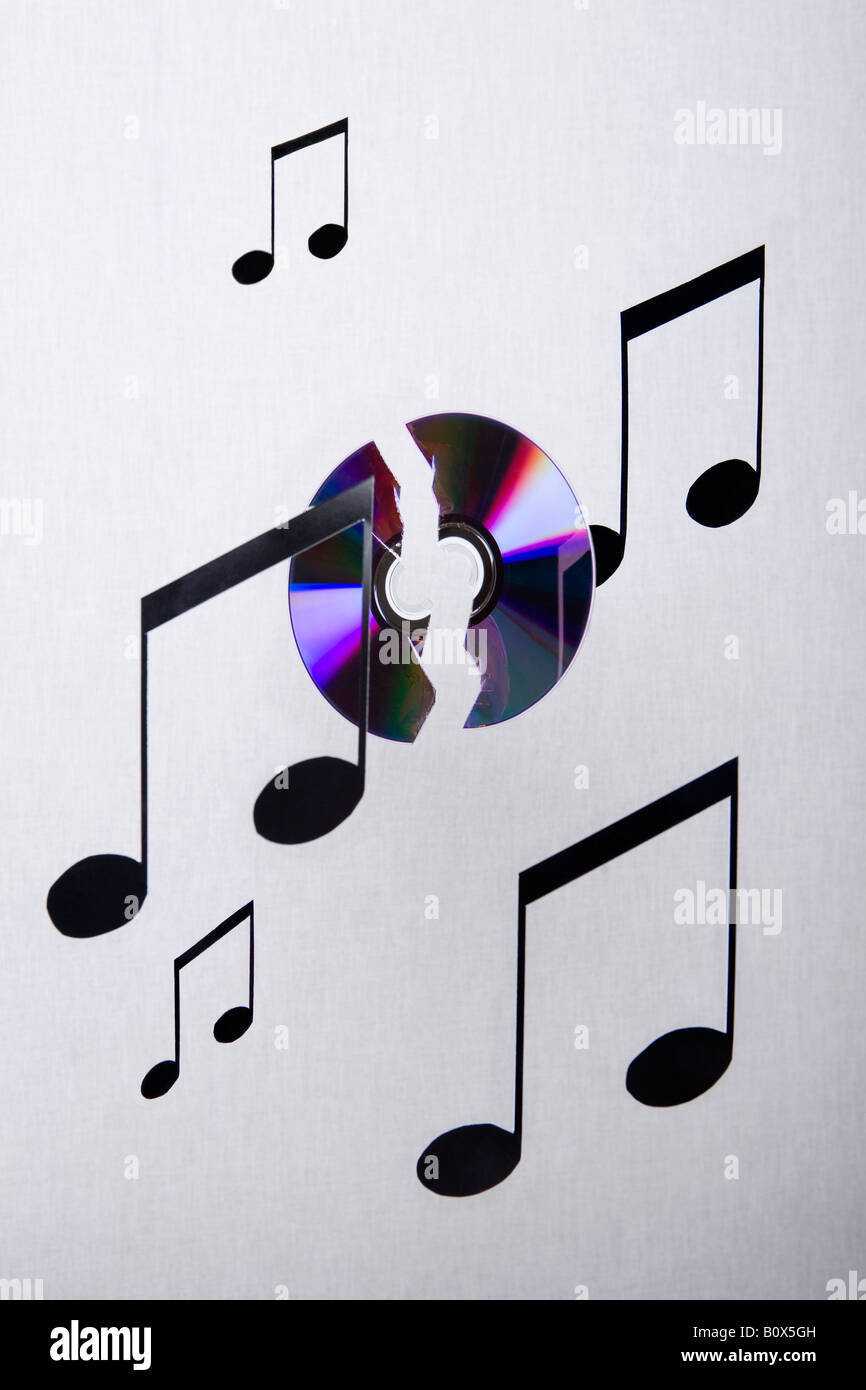 Musical notes and a CD suspended in mid-air Stock Photo