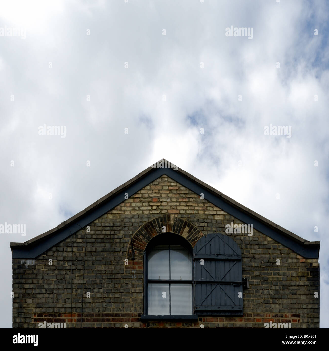 Arched window in brick wall Stock Photo - Alamy