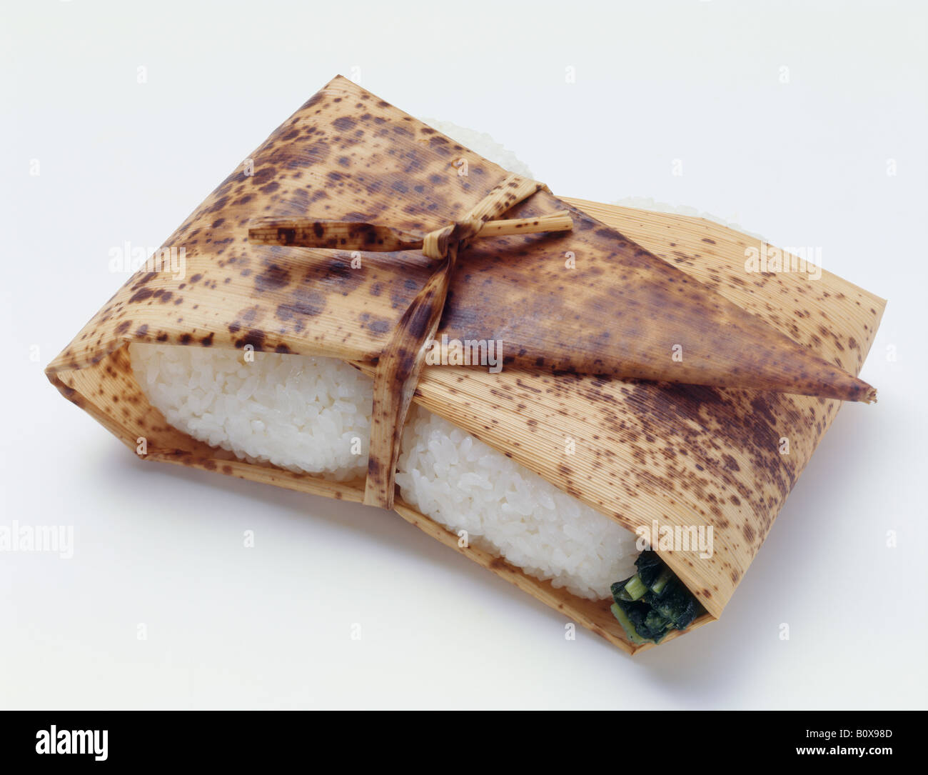 Wrapped Rice Ball Rice balls wrapped in wood shaving Stock Photo - Alamy