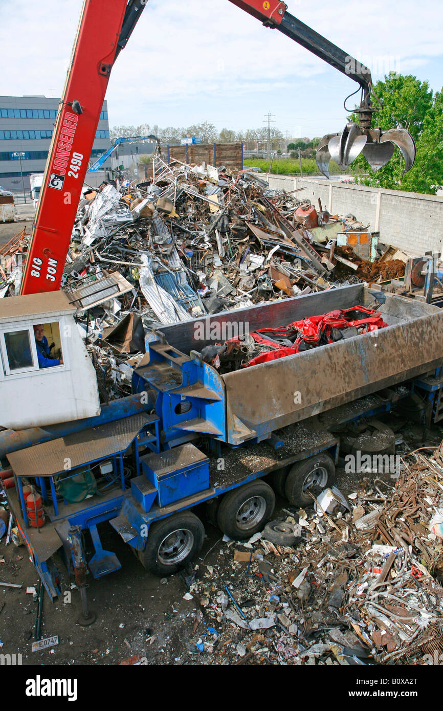 Crushed car in junkyard Stock Photo