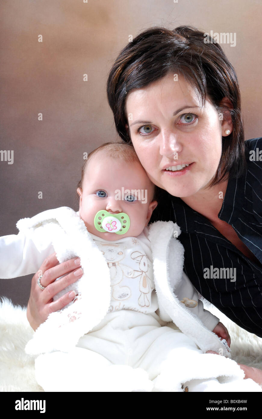 mother with six-month-old daughter Stock Photo