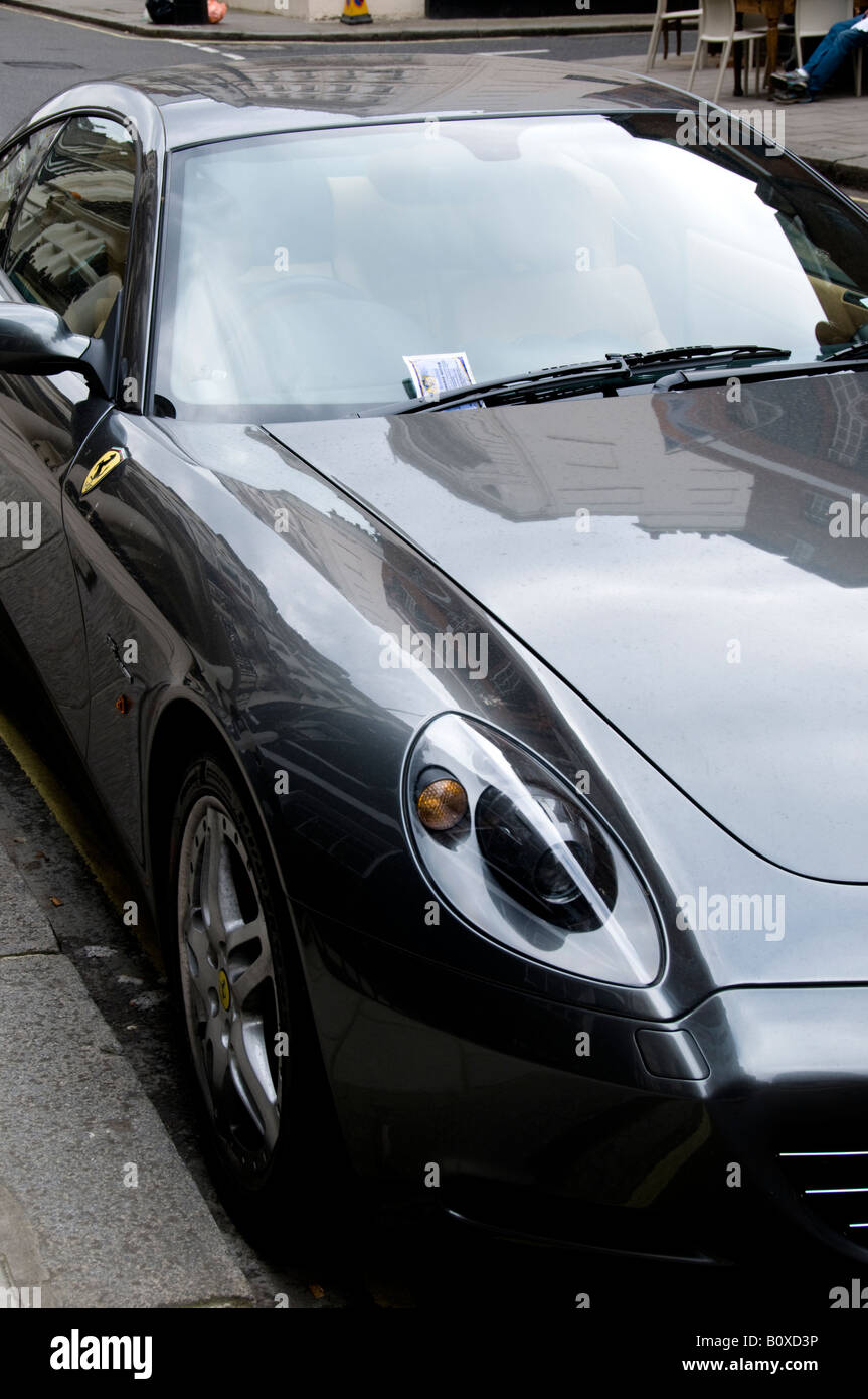 Ferrari with Penalty Charge Notice on windscreen, London, England Stock Photo