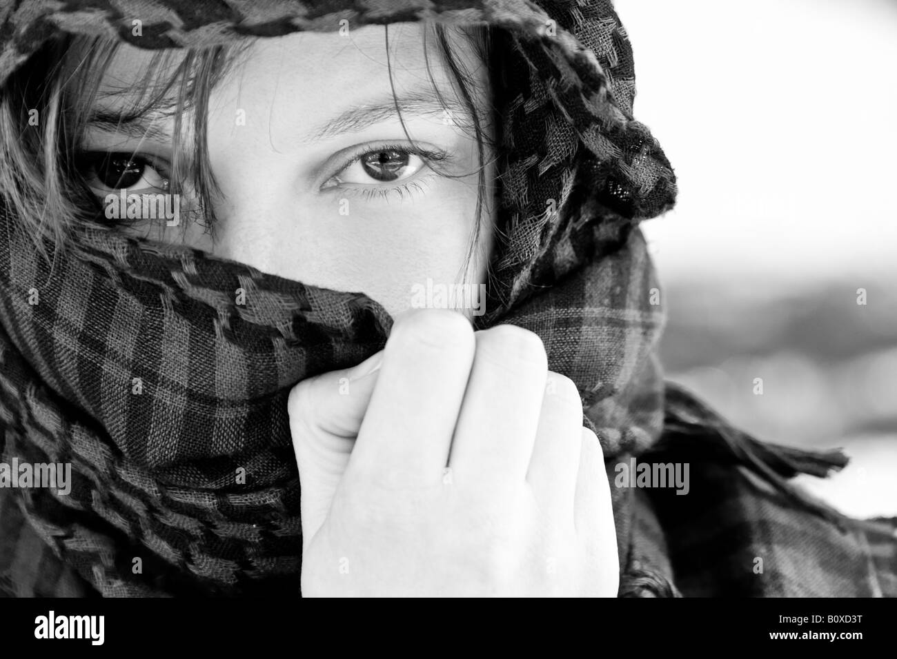 Staring woman portrait covered by veil Stock Photo