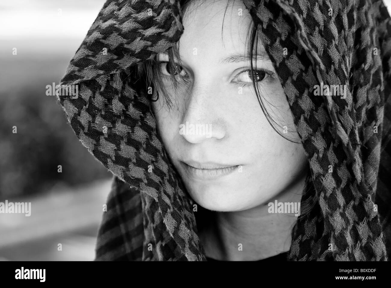 Staring woman portrait covered by veil Stock Photo