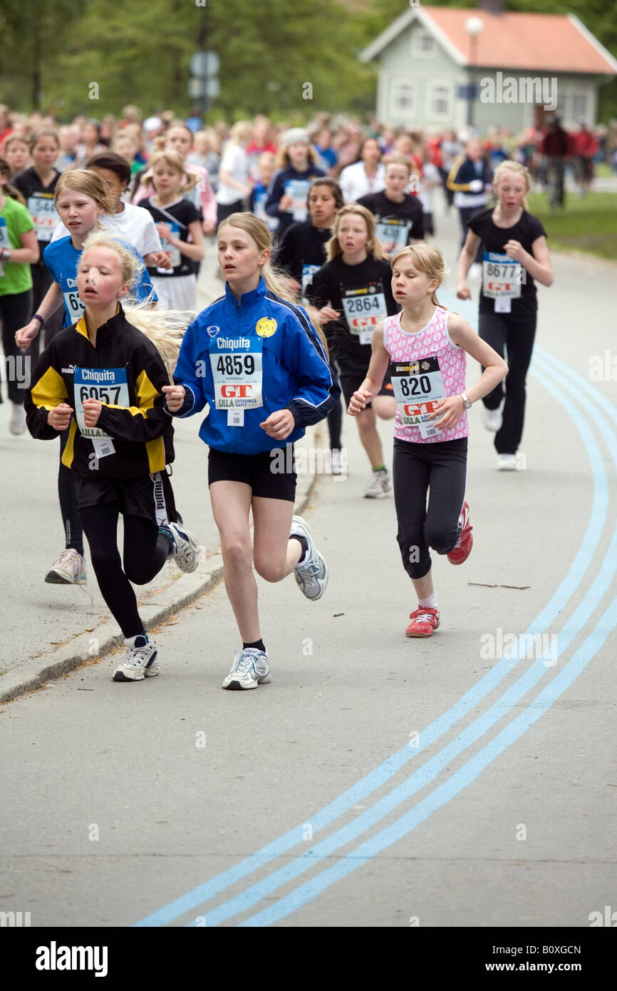 Children running track 11 year hires stock photography and images Alamy