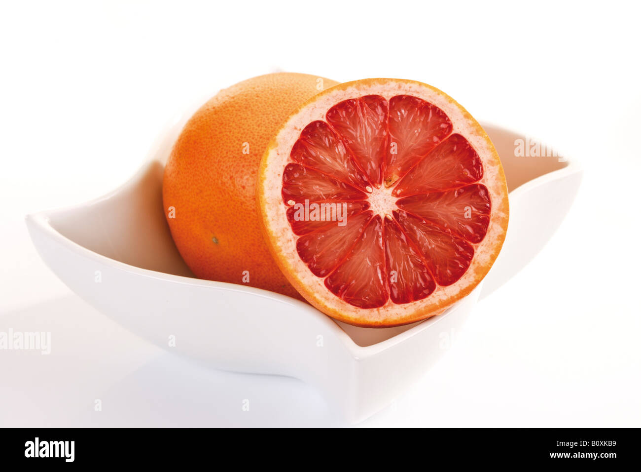 Half sliced citrus fruit halved hi-res stock photography and images - Alamy