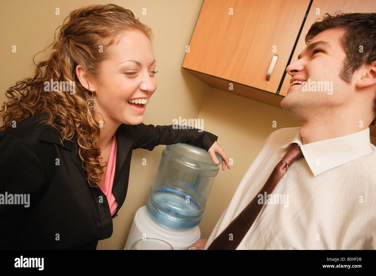 Water cooler talk Stock Photo Alamy