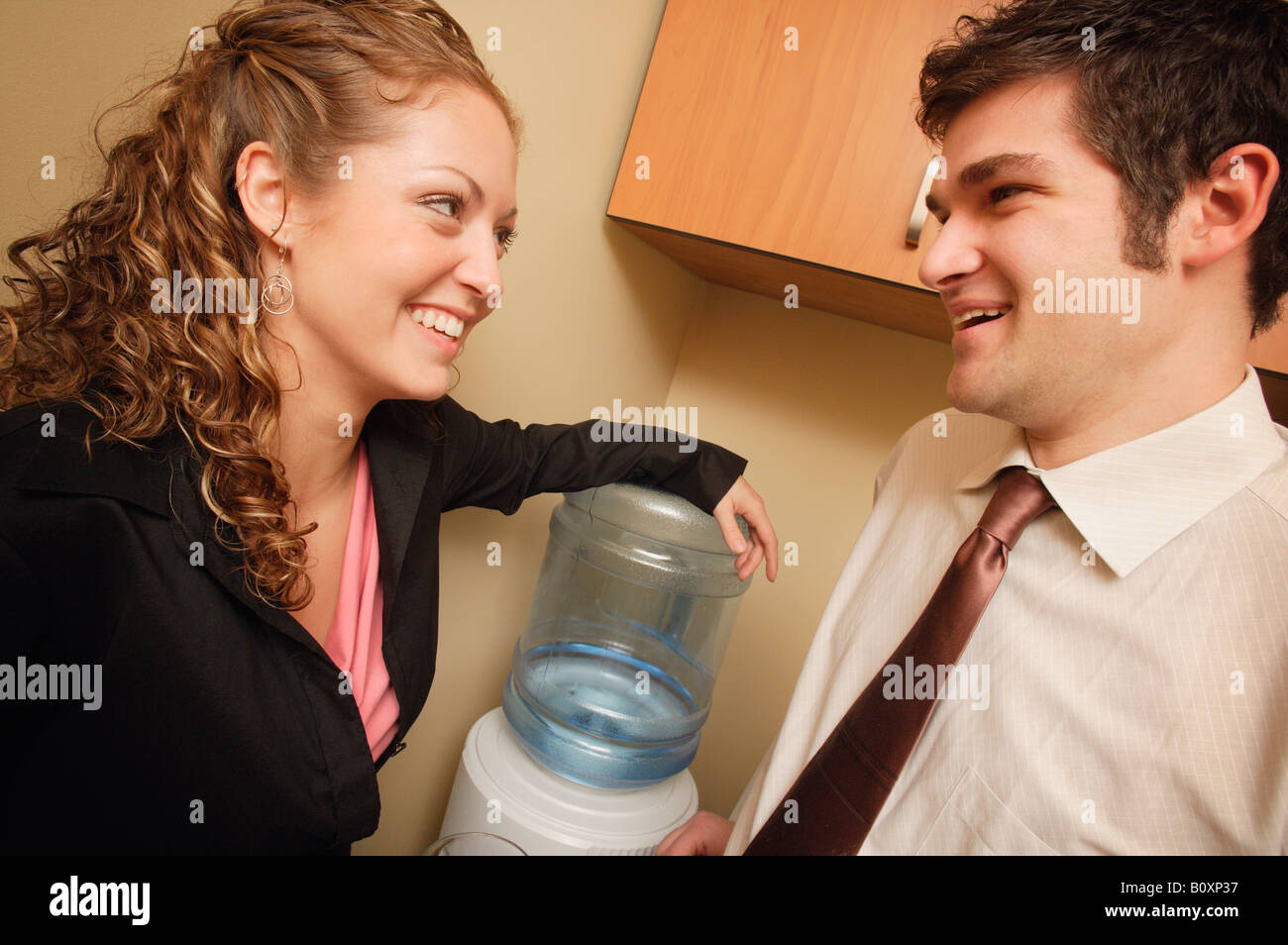 Water cooler talk Stock Photo Alamy