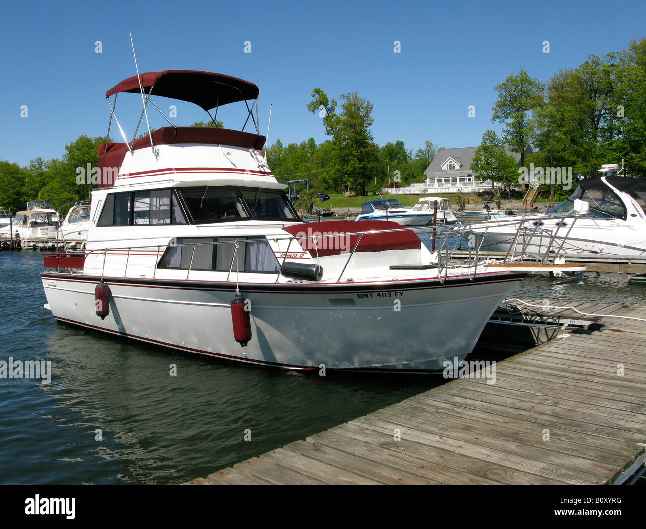 Luxury cabin cruiser at dock. Stock Photo