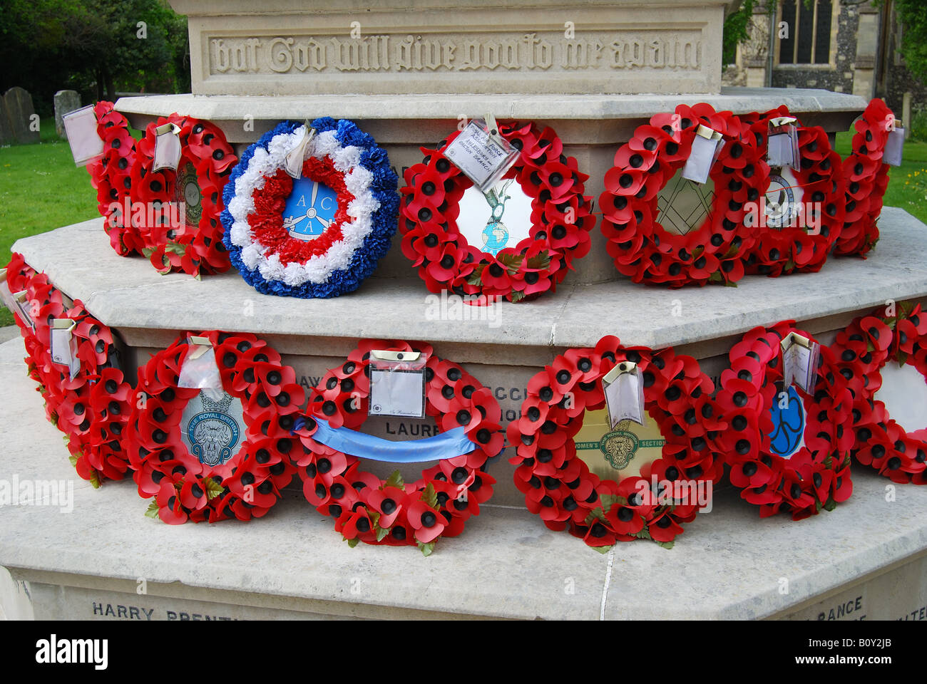 Wreaths on war memorial, High Street, Tring, Hertfordshire, England, United Kingdom Stock Photo