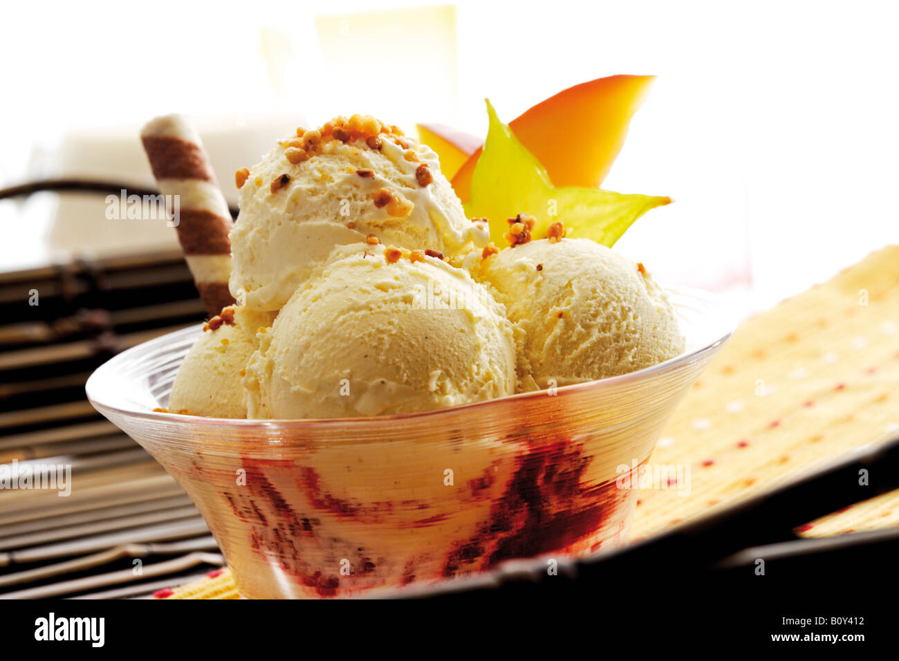 Vanilla ice cream with brittle Stock Photo Alamy