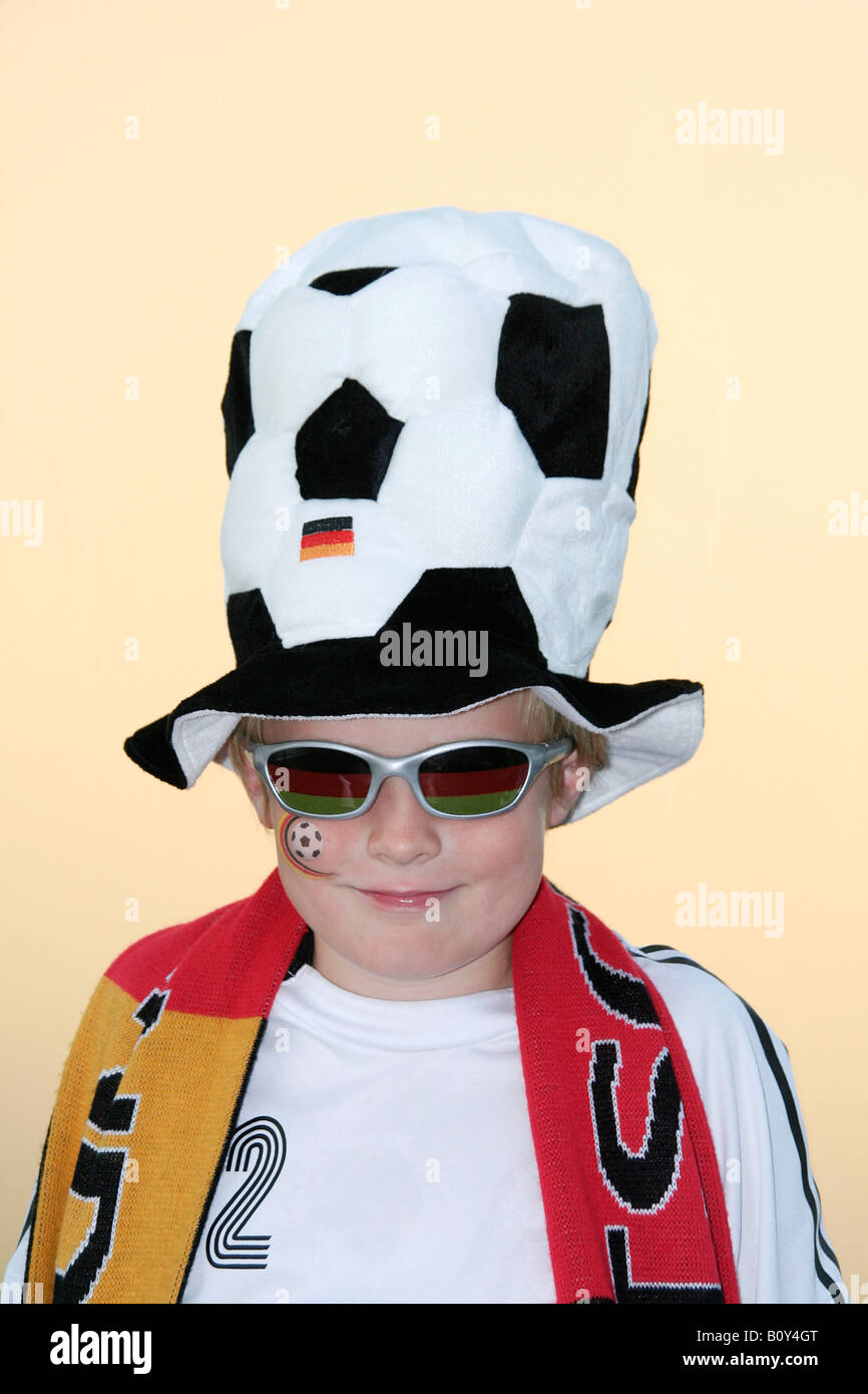 Boy (10-13), soccer fan, portrait Stock Photo