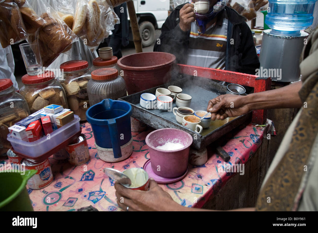 Making tea on the side of the road in Dhaka Bangladesh Stock Photo Alamy