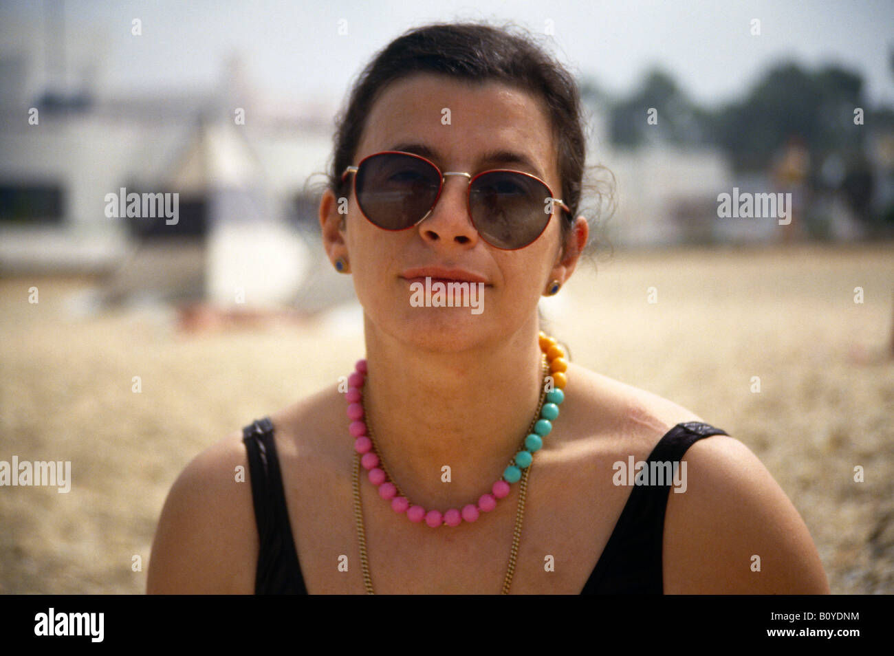 Cyprus Woman Wearing Sunglasses On The Beach Stock Photo Alamy