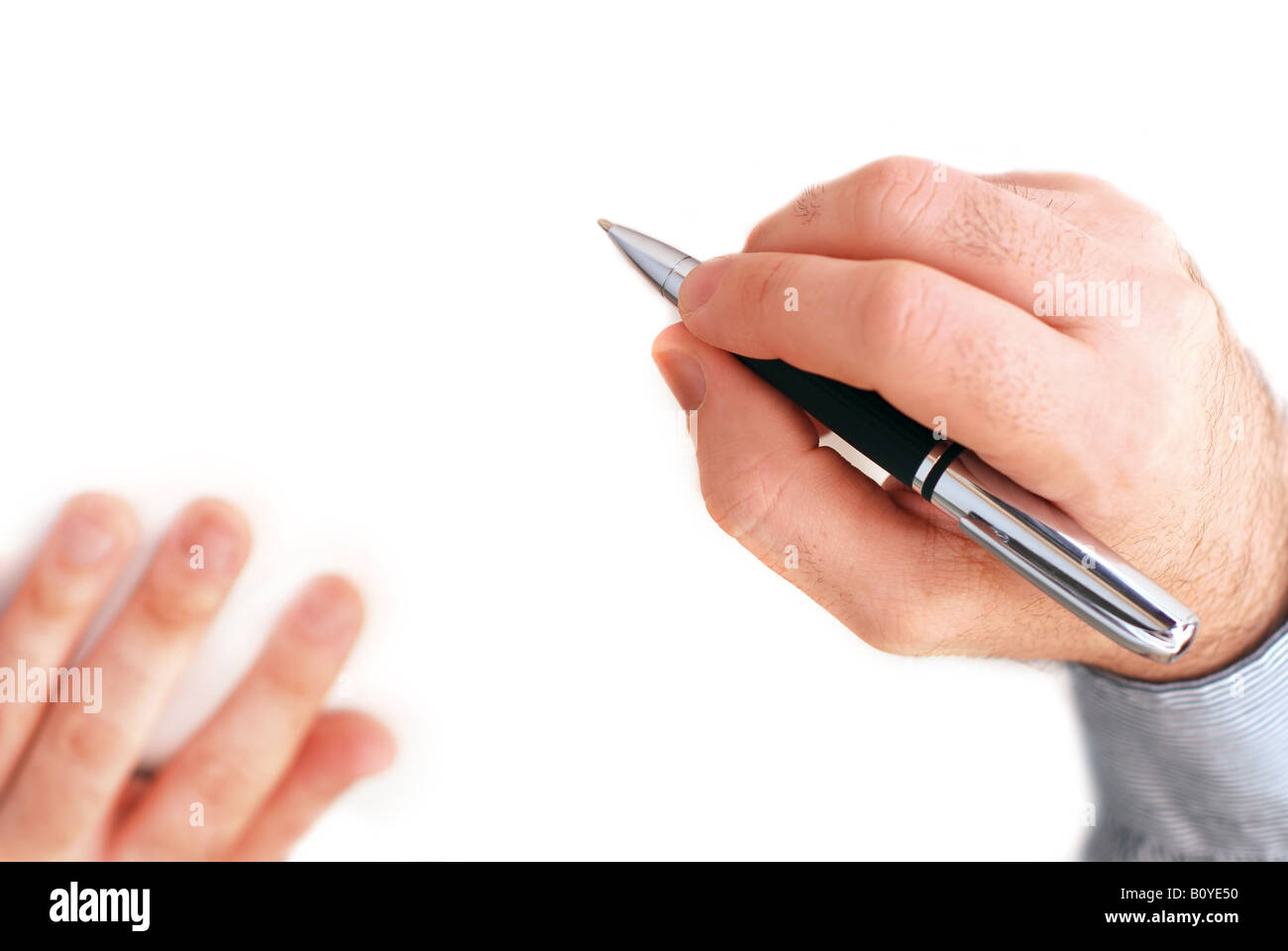 Closeup of businessman s hands on white background holding a pen Stock ...