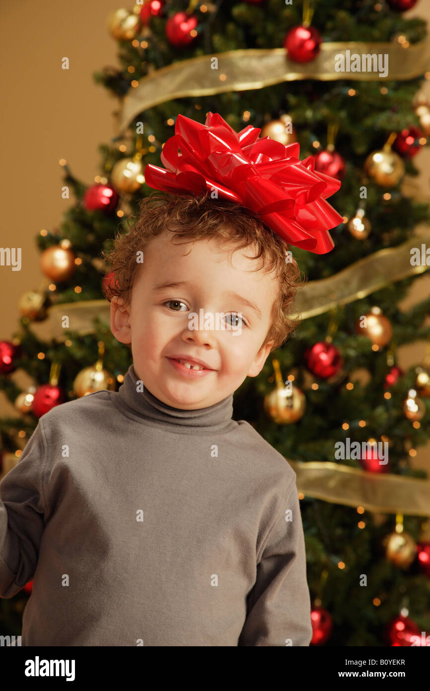Child facing christmas tree hi-res stock photography and images - Alamy