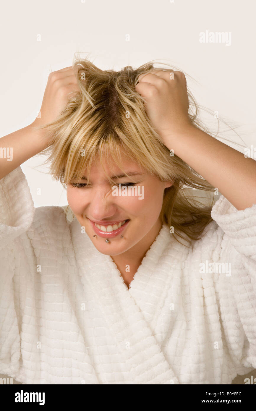 Woman pulling her hair out Stock Photo Alamy