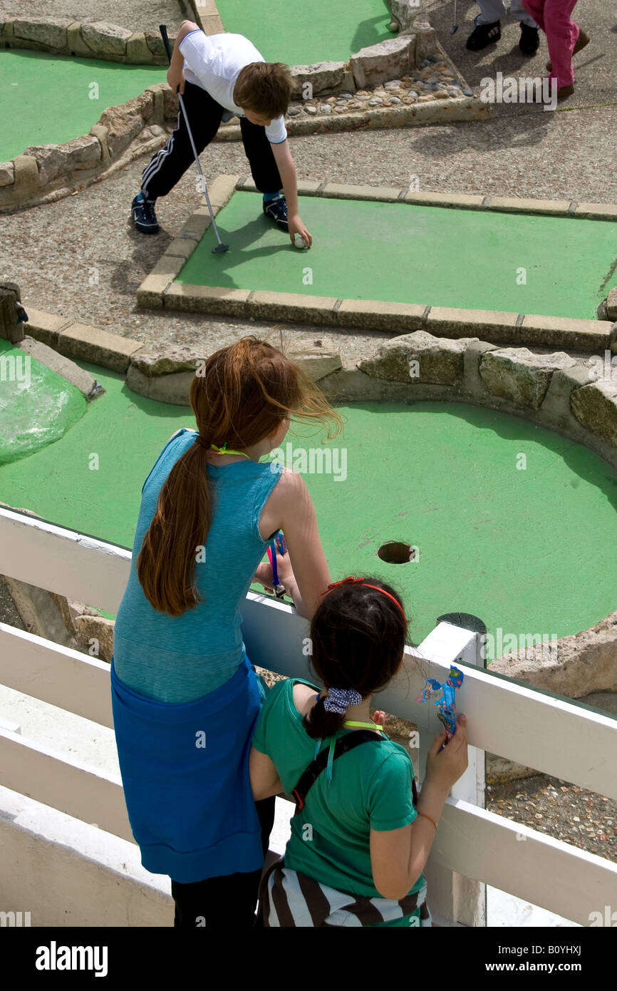 childen playing crazy golf on brighton seafront Stock Photo