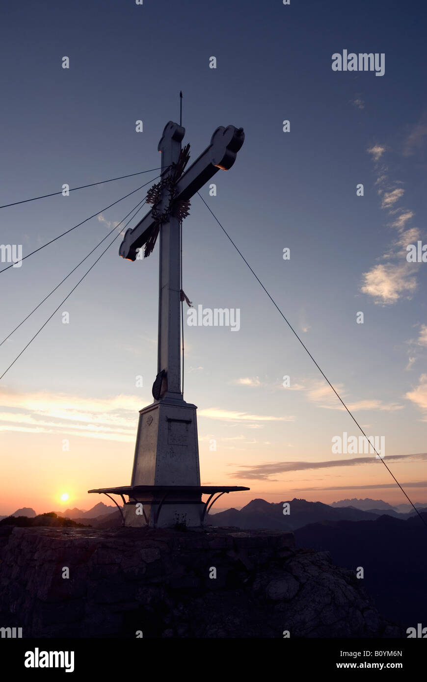 Germany, Bavaria, Wallberg, cross on summit of the moutain Stock Photo