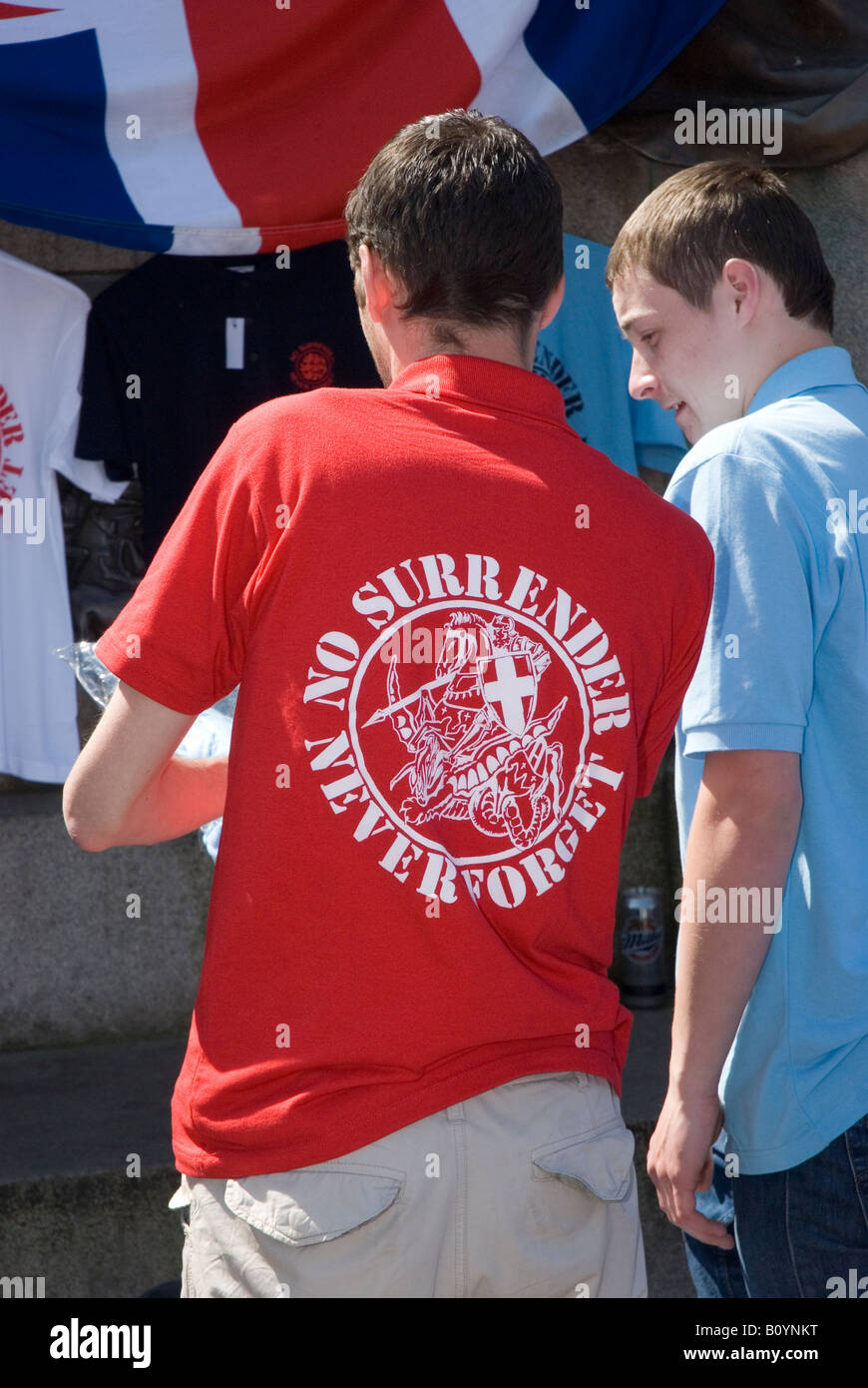 Rangers fans wearing No Surrender polo shirts Stock Photo - Alamy